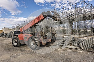 Forklifts in a construction site performing an overpass in the construction of a road photo