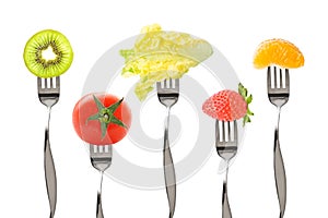 Forks with fruits and vegetables