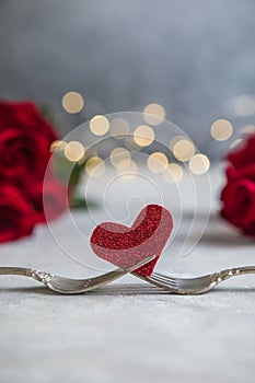 Forks and a heart. Holiday menu for Valentines Day