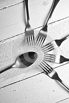 Forks and spoon on wood table