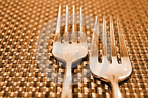 Forks on a straw table