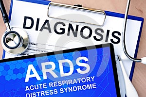 Form with diagnosis and tablet with acute respiratory distress syndrome ARDS