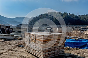 Form sections stacked neatly at staging area