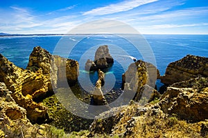 FormaciÃÂ³n de rocas en las costas de Lagos, Algarve Portugal. Rock formation on the shores of Lagos, Algarve Portugal. photo