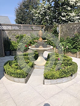 Formal courtyard garden with fountain.