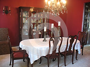 Formal Dining Room with China Cabinet and Chandelier