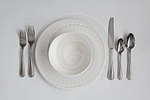 Formal Dinner Place Setting Utensils and Dishes