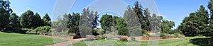 Formal Garden with mature Trees and Flowers Panorama/Banner
