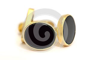 Formal gold and oval black onyx cufflinks