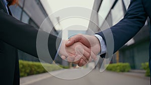 Formal handshake business handshaking businessman shaking hands with businesswoman success close up shake arms together