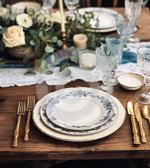 Formal holiday tablescape with blue decor, dinner table setting, table scape with elegant tableware and dinnerware for