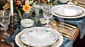 Formal holiday tablescape with blue decor, dinner table setting, table scape with elegant tableware and dinnerware for wedding