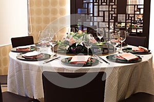 Formal table setting with flower decoration