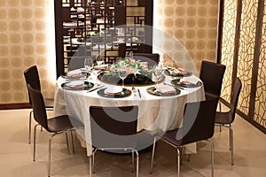 Formal table setting with flower decoration