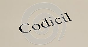 Formal text 'Codicil' printed on textured paper, representing legal or historical documents