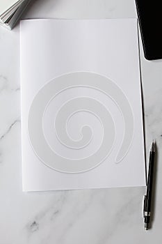 A4 format paper with business cards  and pen on table