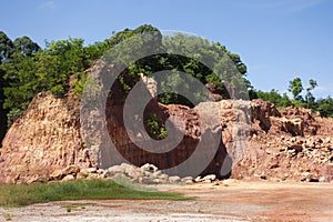 Formation canyon rocks originated from soil landscape and natural erosion of sandstone into various shapes and digging pit on