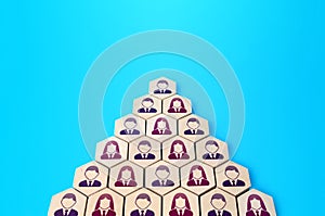 Formation in the form of a pyramid. Classic form of organizational management. Career, corporate culture. Reliable structure photo