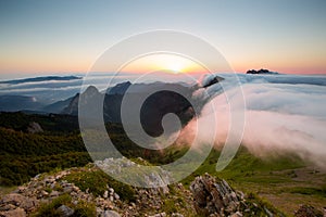 The formation and movements of clouds up to the steep slopes of the mountains of Central Caucasus peaks.