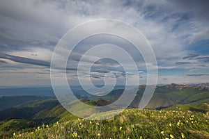 The formation and movements of clouds up to the steep slopes of the mountains of Central Caucasus peaks.