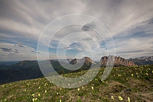 The formation and movements of clouds up to the steep slopes of the mountains of Central Caucasus peaks.