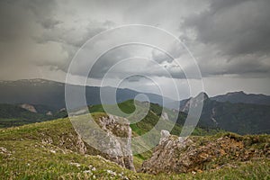 The formation and movements of clouds up to the steep slopes of the mountains of Central Caucasus peaks.