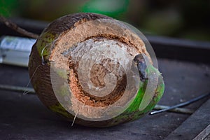 Formed of a coconut shell, rotten coconut