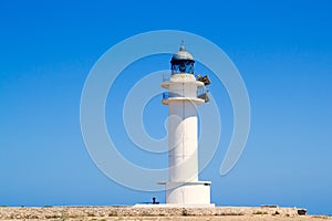 Formentera Barbria Lighthouse in blue sky