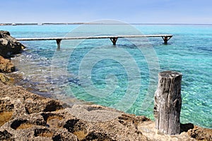 Formentera Illetes turquoise sea wooden pier photo