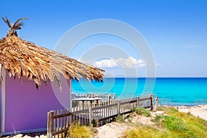 Formentera tropical purple hut on turquoise beach