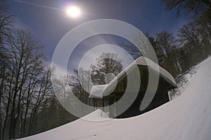 Former hunters cottage Tajch in Low Tatras during night