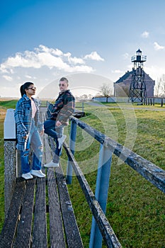 The former island Schokland. The Netherlands with beautiful spring clouds and a blue sky, The former island of Schokland