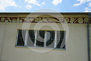 Former laboratory with sgraffito frieze from 1936 in an industrial area. Rüdersdorf bei Berlin, Germany