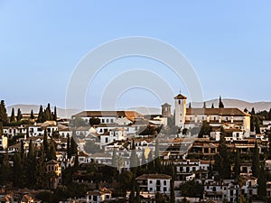 The former Moorish residential district of Albaicin with the Mirador de San Nicolas and the church of San Nicolas in Granada,