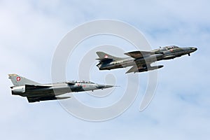 Former Swiss Air Force Dassault Mirage III fighter aircraft J-2012 HB-RDF flying in formation with a Hawker Hunter
