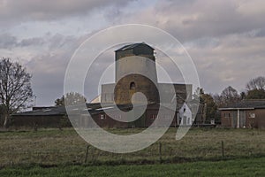 Former windmill in little village Beek photo