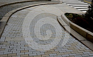 Forming the area of â€‹â€‹the parking lot with a mosaic in the shape of a wheelchair. reservations for handicapped dri