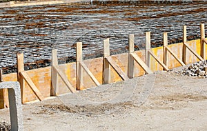 formwork during laying cement to make the foundation of the building on the construction site