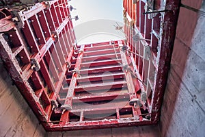 Formwork panels connected by clamps