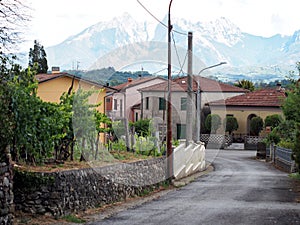 Fornoli village and the Apuane Alps behind. Italy, Lunigiana. photo