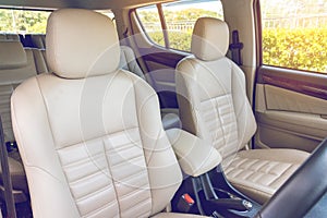 Fornt passenger seats in modern luxury car