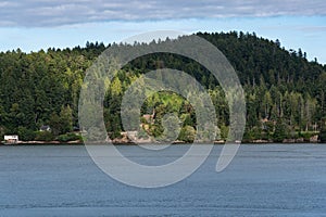 Forst covered island in the Pacific Ocean near Canada