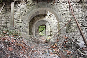 Fort Bastione, a nineteenth-century military fortress, abandoned to the neglect of nature. distressing stone construction inside
