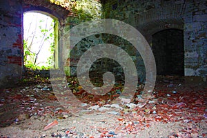 Fort Bastione, a nineteenth-century military fortress, abandoned to the neglect of nature. distressing stone construction inside