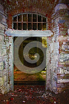 Fort Bastione, a nineteenth-century military fortress, abandoned to the neglect of nature. distressing stone construction inside