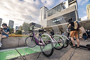 Fort Bonifacio, Taguig, Metro Manila - Typical weekend scene at Bonifacio Highstreet. A bike sharing station installed