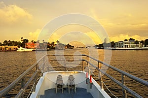 Fort Lauderdale, Florida, U.S.A - January 3, 2020 - The view from the boat of luxury waterfront homes by the bay before sunset