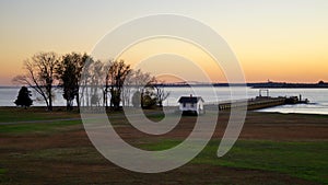 Fort Mott State Park waterfront, sunset view with Delaware River, Pennsville Township, NJ, USA photo