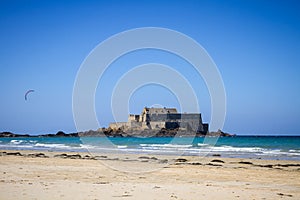 Fort National and a kite surfer on sea in Saint-Malo city, Brittany, France