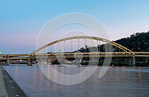 Fort Pitt Bridge and Monongahela River in Pittsburgh in Pennsylvania. Sunset Sky and Light